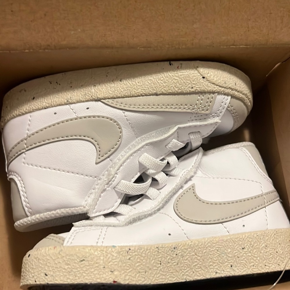 Nike Kids White Sneakers with Cream Swoosh